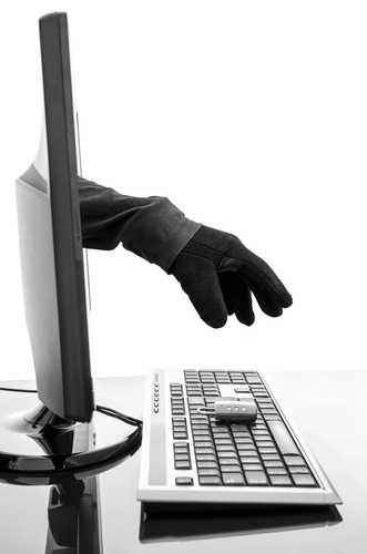 Hand reaching through computer